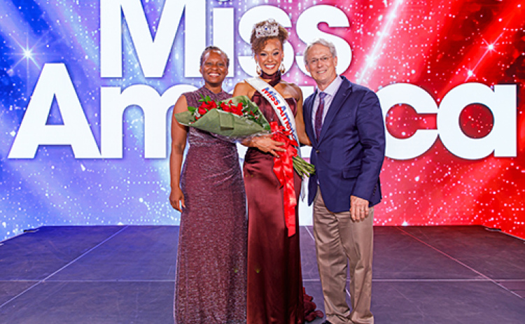 Miss America 2027, Regan Hutsell of Texas, poses for a picture with her parents Romanda and Robert Hutsell after winning the title on Sunday, Sept. 6 in West Palm Beach, Fla. Robert is a 1976 graduate of Hampton High School.