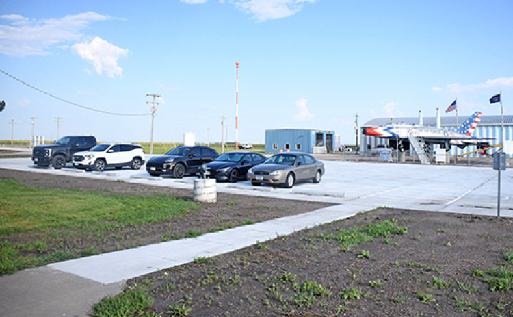 The main driveway and parking area outside the airport manager’s office were replaced with new concrete during construction this summer at the Aurora Airport.