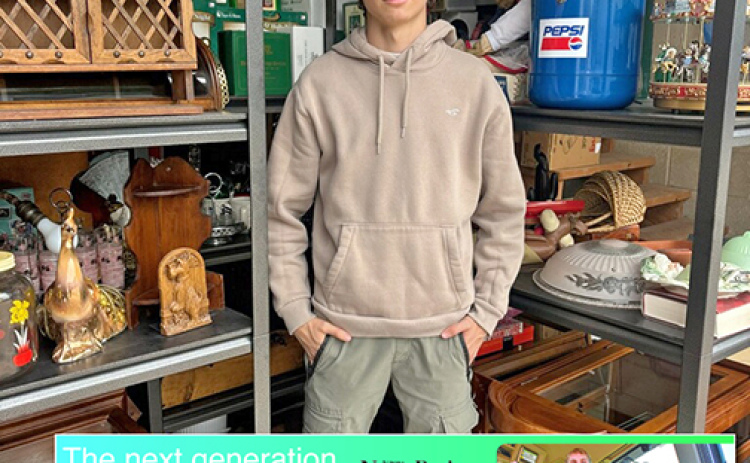 Lofton Ferguson stands in his warehouse amid the merchandise he has listed for sale in his eBay store. Ferguson graduated from Hampton High School this past spring but decided to forgo college for now to focus on his thriving online business.
