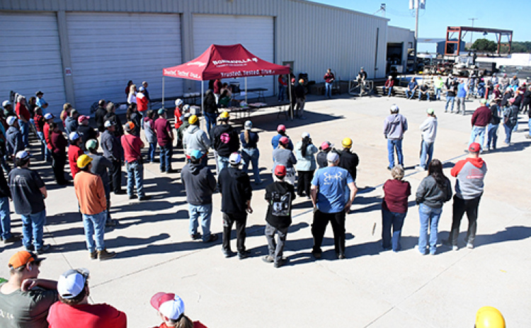 Plant manager Mike Morrow addresses BonnaVilla Homes employees Friday during a luncheon event in recognition of National Manufacturing Month.