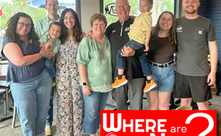 Brian Connick and his wife Cari (center) retired from Algona Community Schools in May. Pictured with them is their family.