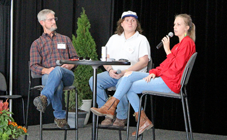 Representatives of the Nebraska Department of Water, Energy and Environment present a program on the department’s new ONE RED program at the recent Husker Harvest Days farm expo. From left are Doug Barry, Sam Fleagle and Alexa Davis.