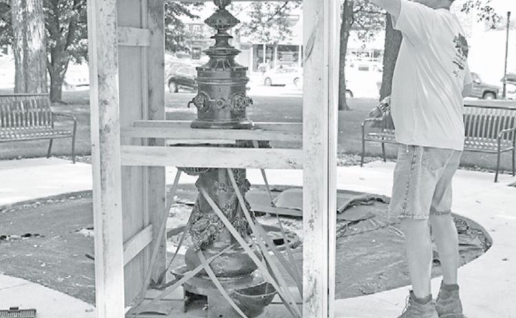 Historic fountain returns home