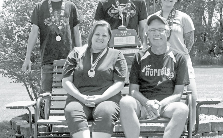 Pictured from left, winners of six state championship victories in football and volleyball, are Noah Roberts, Andrea Omel, Colton Roberts, Skeeter Omel and Madison Omel. News-Register/Richard Rhoden
