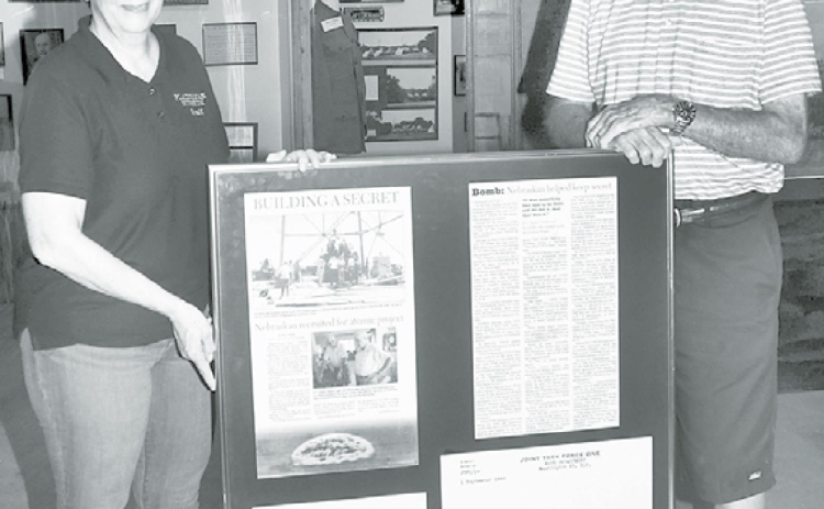 Plainsman Director Tina Larson (left) was on hand to accept this historical donation on behalf of late Hordville native Junior Nelson by his friend Shorty Hahn. News-Register/Kurt Johnson